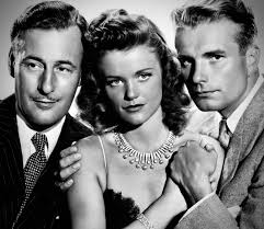 Simone Simon as “Irena Dubrovna”; Kent Smith as “Oliver Reed”; and Tom  Conway as “Dr. Louis Judd”, a psychiatrist; in Jacques Tourneur's American  supernatural horror film, 'Cat People'