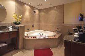 Looking for a hotel with private jacuzzi in singapore? King Bed Room Suite Jetted Tub At The Hotel Iris