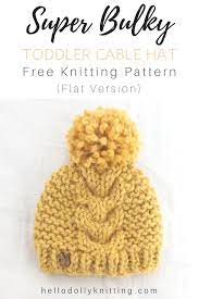 Free Super Bulky Cable Hat Knitting Pattern For Toddlers Flat Version Knitting Freeknitti Knitting Patterns Free Hats Baby Hats Knitting Cabled Hat Pattern