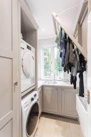 And maybe even doing laundry! Utility Room Designed By Burlanes Laundry Room Design Utility Room Designs Small Utility Room