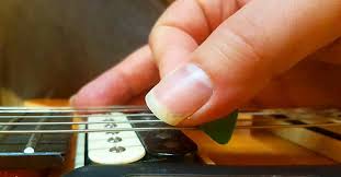 And it's the same with how you hold your pick. How To Hold A Guitar Pick Correctly For Strumming Speed The Like Music Industry How To