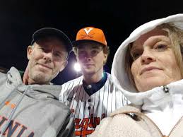 Virginia player gifts fan with signed baseball after she gives his home run  ball to his dad