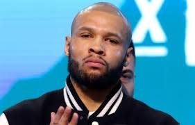 Who is Roman Fury, how is he related to Tyson and what is his pro boxing  record?