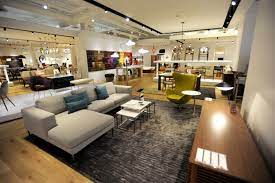 A Living Room Made Just For You Featuring The Neo Sectional Chaise Left Showroom Interior Design Furniture Store Interior Furniture Showroom Design