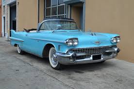 Image result for Turquoise 1958 Cadillac