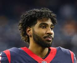 Braxton Miller and Troy Smith team for Champaign County youth football camp