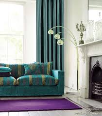 Different intensities of gray on walls, furniture, and window treatments play with bright pops of pink and teal for a colorful yet sophisticated effect. Teal And Purple Room Decor Novocom Top