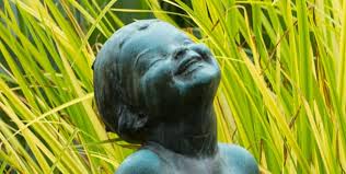 Whimsical resin frog figurines make great frog gifts for the frog lover and frog collector. Atlanta Botanical Garden Frog Baby