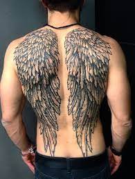 The most striking features of angel tattoo designs are their wings. 20 Cool Angel Wing Tattoos For Men In 2021 The Trend Spotter