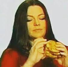 Amy eating a burger (?)
