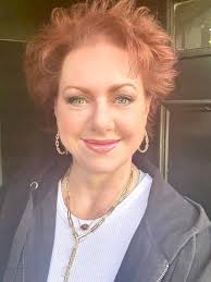 Watching TV with us.