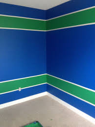 Painted Jesse S Room Vancouver Canucks Colours Blue And Green Bedroom Boy Room Paint Boys Room Blue Boys Bedroom Green