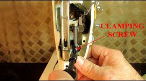 Place a brand new universal needle in the needle holder. Set Needle And Presser Bar Height On Singer Model 237 Sewing Machine Youtube