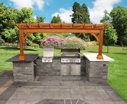 Add a refrigerator, grill or barbeque for a stylish outdoor living space you'll use for years. Outdoor Custom Built In Kitchen Islands Stone Granite Veneer Outdoor Backyard Backyard Backyard Buildings