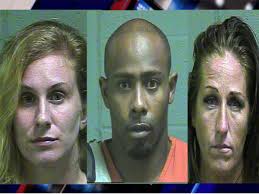 Police: Woman arrested for domestic assault after finding photos