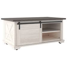 Made of solid pine wood, the barn door coffee table is a beautiful farmhouse style table that will create the perfect centerpiece for your room. Signature Design By Ashley Dorrinson Two Tone Farmhouse Rectangular Cocktail Table With Barn Door And Casters Royal Furniture Cocktail Coffee Tables