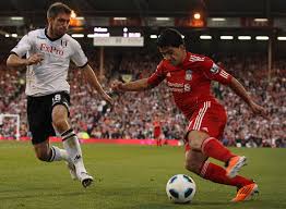 The reds return to premier league action this week on the road against fulham f.c. Aaron Hughes Luis Suarez Luis Suarez Photos Fulham V Liverpool Premier League Zimbio