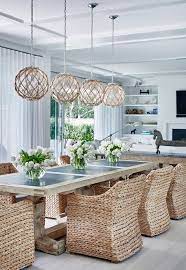 You'll find gorgeous lamps, pendants, chandeliers and more. This Hamptons Beach House Is What Summer Dreams Are Made Of Domino Elegant Dining Room Dining Room Design Dining Room Decor