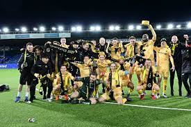 Starts eirik schulze jubler med lagkamerater. Seriemester 2020 Skjerf Glimt