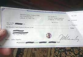 The Fake Check-Deposit Scam - Nolan Dalla