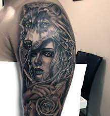 Wolf tattoos for men are executed to look as lifelike as possible, using one or several colours. 70 Wolf Tattoo Designs For Men Masculine Idea Inspiration Wolf Tattoos Men Wolf Tattoos Wolf Tattoo Design