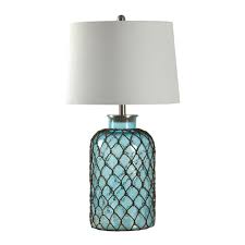 A lamp can provide ambient lighting for your reading nook or brighten the whole room. Beach Table Lamps Montego Bay Seeded Glass And Netting Table Lamp Bella Coastal Decor