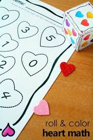 Math activities for preschoolers and toddlers like this one that introduces the concept of volume. Valentine Math Roll And Color Activity Fantastic Fun Learning Math Valentines Valentine Math Activities Valentine Activities