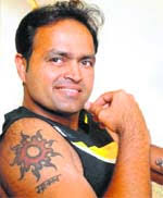 Spirituality and sportsmanship go hand in hand. That&#39;s what cricketer Dinesh Mongia&#39;s tattoo depicting the Surya motif seems to say. - ttlife9
