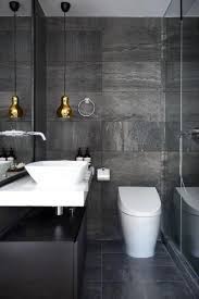 The hues come from the accents from the hexagonal floor tiles, the natural veins on the granite wall and floor, and the vanity countertops. Top 60 Best Grey Bathroom Ideas Interior Design Inspiration