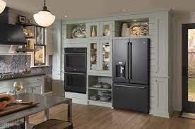The Deep Charcoal Color Of Our Black Slate Appliances Perfectly Complements The Stain Slate Appliances Slate Appliances White Cabinets Slate Appliances Kitchen