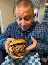 🍔 Mozzarella Stick Burger 😮😮😮 ❓Topped with Mozzarella along with a  Pesto & Garlic Glaze Get yours at PVD Pizza in West Warwick Great food with  a large dining room with a
