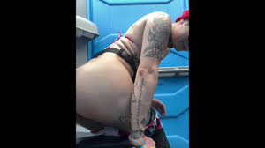 Peeing in a Public Port-A-Potty at a Festival