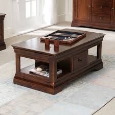 I don't know because it's seriously one of our favorite pieces of furniture in our home. French Hardwood Mahogany Stained 1 Drawer Coffee Table The Furniture Market