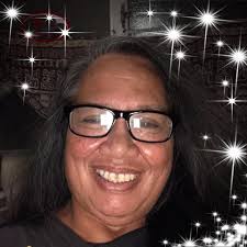 Resident cleans up sidewalk weed and returns shopping carts in Kaneohe