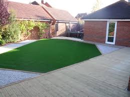 Check spelling or type a new query. Large Decked Area With Shaped Artificial Lawn And Decorative Gravel Artificial Lawn Artificial Grass Low Maintenance Garden