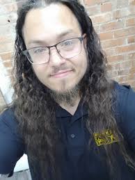 What is the best spot in town for men's long hair styles with bald faded  sides and braids?