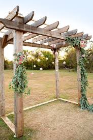 Diy Wedding Pergola With Flowers And Eucalyptus And Hanging Globe Flowers Wedding Pergola Pergola Decorations Wedding Trellis