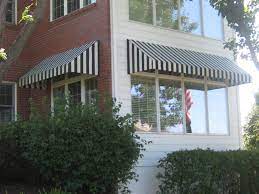 Traditional Window Awnings With A Bold Stripe Traditional Windows Window Awnings Boat Covers