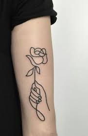 75 brilliant rosary tattoo ideas and their meanings wild. 22 Hand Holding Rose Tattoo