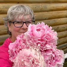 Oh man…I just got all my peony books out. I know it's bad to “always want  more” and not be content with what you have…I know. But I want more  peonies. Way