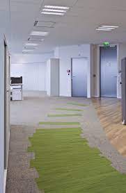 An evolution of traditional square carpet tiles, our 25 x 100 cm skinny planks offer a new world of interior design. Amazing Use Of Interface Skinny Planks A Natural Bright Office Environment Floor Design Biophilic Design Commercial Flooring