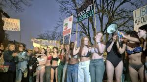 Forty young women strip in front of the Iranian embassy in Brussels | VRT  NWS: news