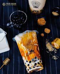 Well, the tiger sugar name comes from the 'tiger stripes' formed when the dark brown sugar syrup interacts with the thick milk tea in the cup. Breaking Tiger Sugar Is Opening Its First Outlet In Penang Penang Foodie