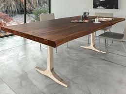 By choosing a dining table with a simple design, you can choose to create a dining room that's more traditional or completely contemporary. Saloom Furniture Peter Francis Black Walnut 80 Wide Rectangular Dining Table Slmwwws4280apo