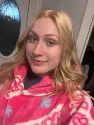 Hello everyone! My name is Danielle (or Danni for short, I'm pictured with  the mug) and I love to cook, bake, and play animal crossing! I'm the  produce manager at my local