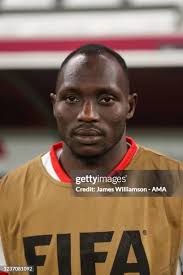 Hubert Velud, Head Coach of Sudan talks to fourth official Matt... News  Photo