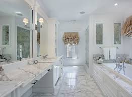 Contemporary white master bathroom with marble floors. Carrera Marble Bathroom