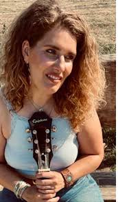 I do the best I can, but Superman's still just a Man sometimes.” Someone  behind us took this photo during Morgan's rendition of “Superman” tonight.  I held my kids the entire song.