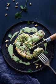 Zaatar Roasted Cauliflower Steaks With Green Tahini Sauce Feasting At Home Recipe Cauliflower Steaks Roasted Cauliflower Roasted Cauliflower Steaks