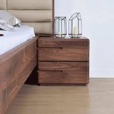 With everything in its place, this product is ready for a cozy, lazy night. Nordic Walnut Nightstand Minimalist 2 Drawer Bedside Table